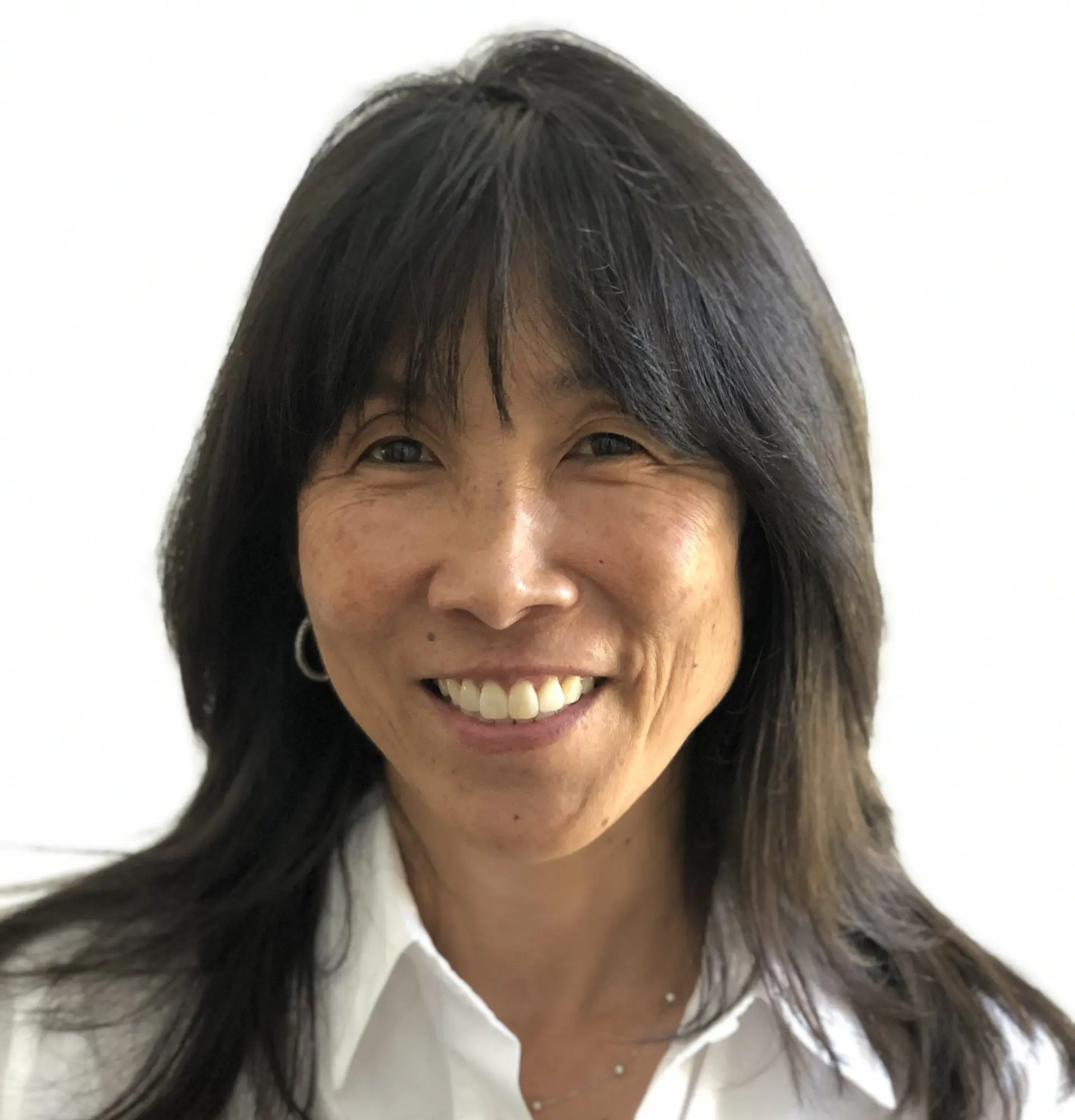 Maya Iwanaga Pinkner smiling for a photo